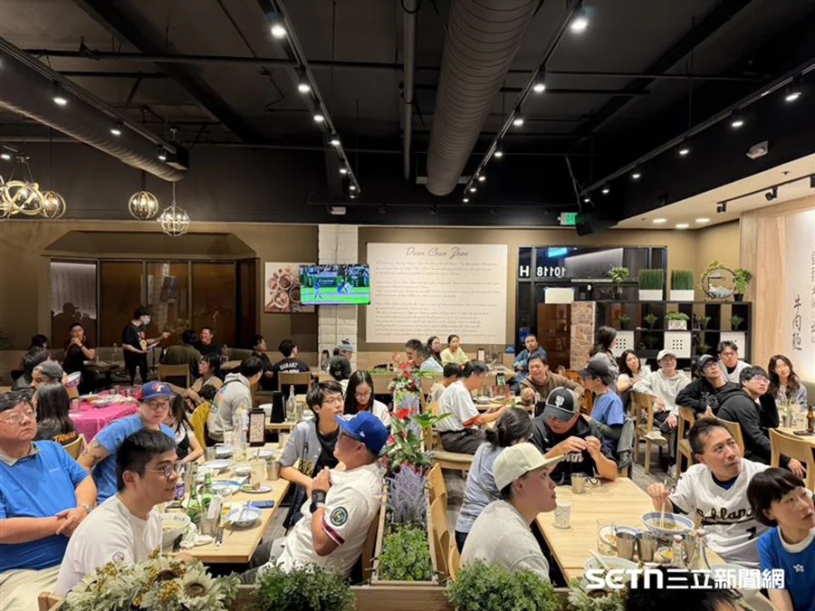 Taiwanese baseball fans wearing Taiwan jerseys watching the Taiwan vs South Korea World Baseball Classic game at Duan Chun Zhen Beef Noodles restaurant in Northern California